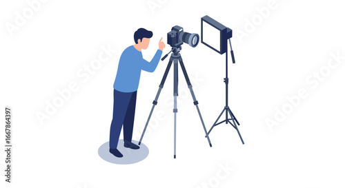 Photographer setting up camera and lighting equipment in studio