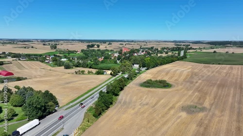 Aerial Piaseczno Poland Church Nativity 1. Northern Poland. Crops, wheat, barley, grain, potatoes and corn. Agricultural equipment. Vistula River, Lake, forest and farm rural area and landscape. 