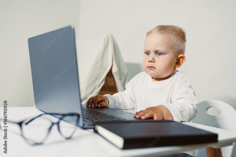 Curious Baby Engaged with Laptop A Childs Early Fascination with Technology Captured in Adorable Moments of Exploration, Showcasing the Promise of Future Development and Creativity Curious Baby Engaged with Laptop A Childs Early Fascination with Technology Captured in Adorable Moments of Exploration, Showcasing the Promise of Future Development and Creativity