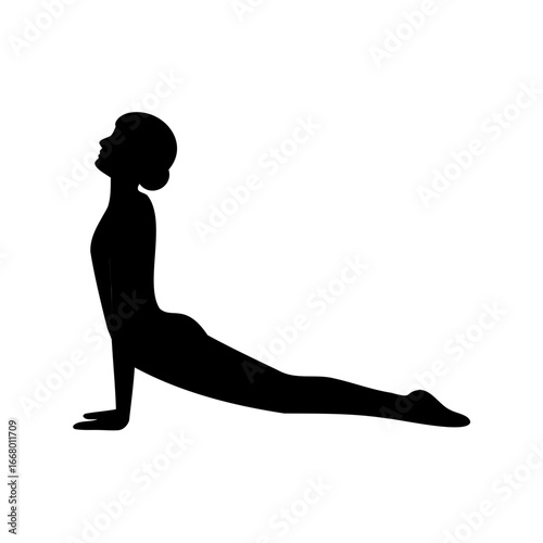 Silhouette of a woman doing the cobra pose in yoga practice
