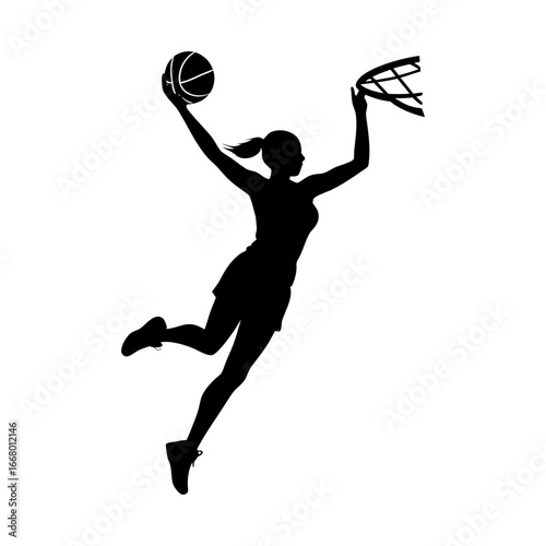 Silhouette of female basketball player jumping with ball towards the hoop