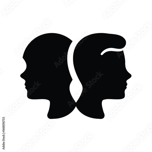 Silhouette of facing male and female heads representing duality and connection