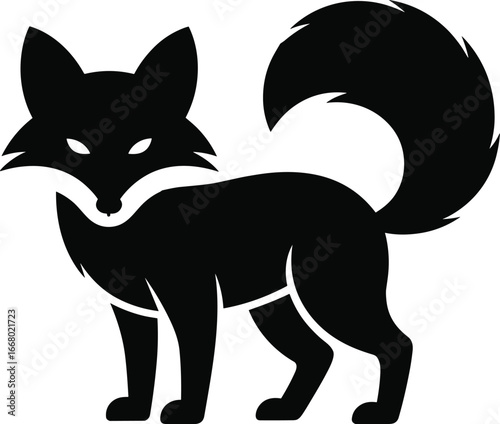 Black fox standing alert with bushy tail animal wildlife