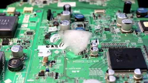 Miyagi Prefecture, Time-lapse video of ice melting on a circuit board, symbolizing hardware fragility, environmental risks, and the irreversible nature of technological and ecological challenges.