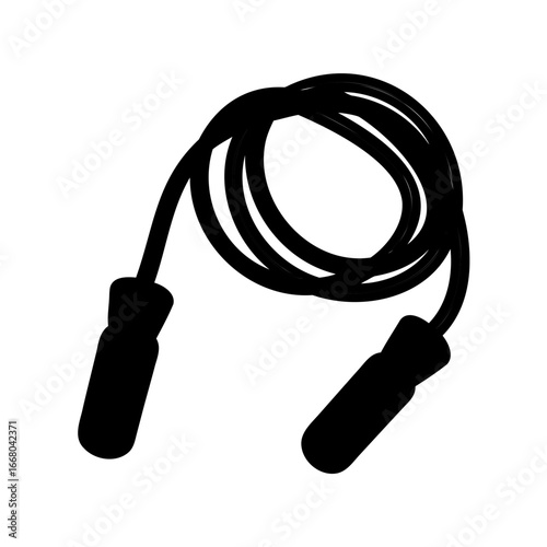 Black skipping rope coiled up, ready for a fitness workout session