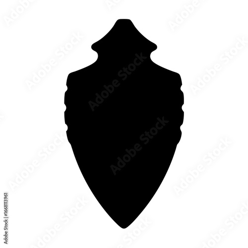 A stylized depiction of a projectile point, like an arrowhead, in black silhouette
