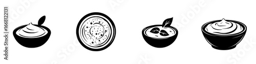 Variety of creamy textures displayed in black bowls against a clean white background