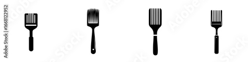 Different types of cooking spatulas arranged in a line against a white background showcasing kitchen tools