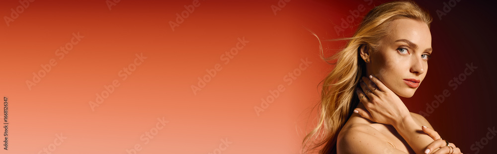 Fototapeta premium Stylish young woman showcases modern fashion in a vibrant urban setting