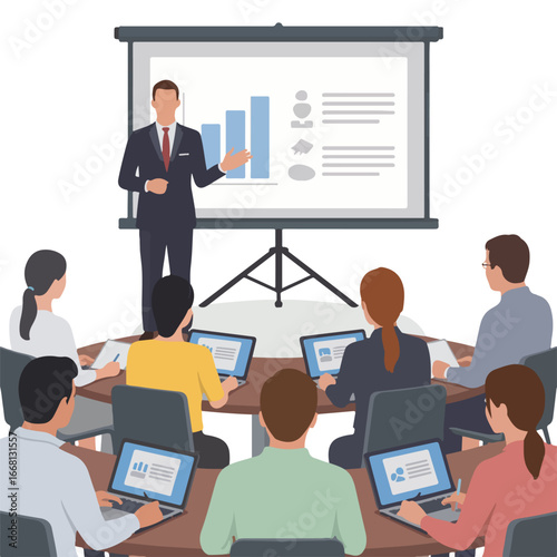 A presenter leads a meeting with a graph on the screen and attendees with laptops around the table