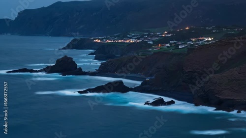 Twilight Coastal Landscape with Rocky Cliffs and Gentle Waves
