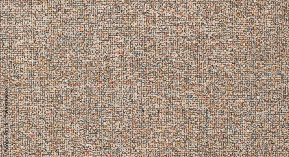 Fototapeta premium Detailed close-up texture of speckled, woven tweed fabric surface