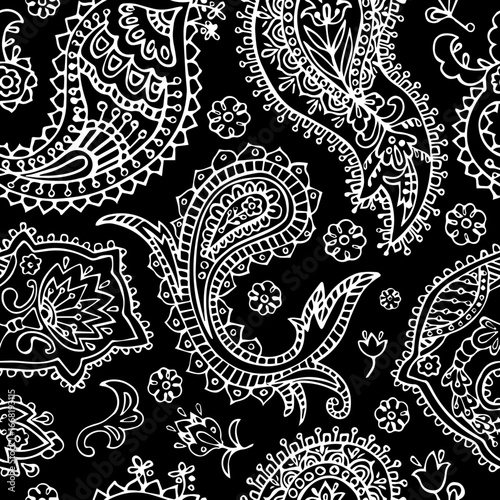 Patrón de diseño paisley mandala blanco sobre fondo negro