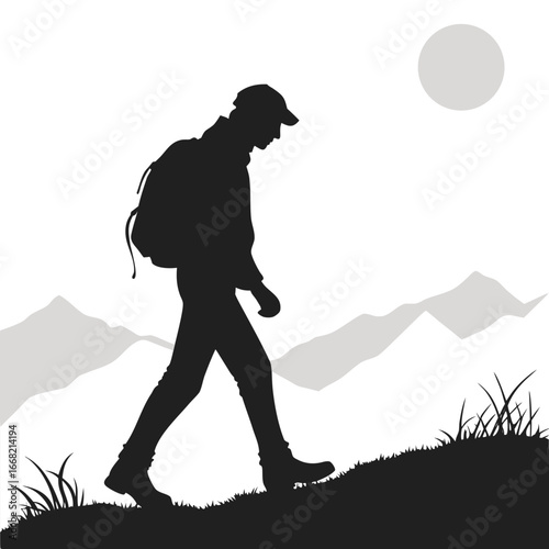 Person hiking at dawn silhouette