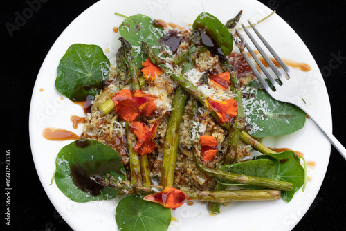 WHITE PLATE OF HEALTHY COLOURFUL VEGETARIAN SUMMER FOOD