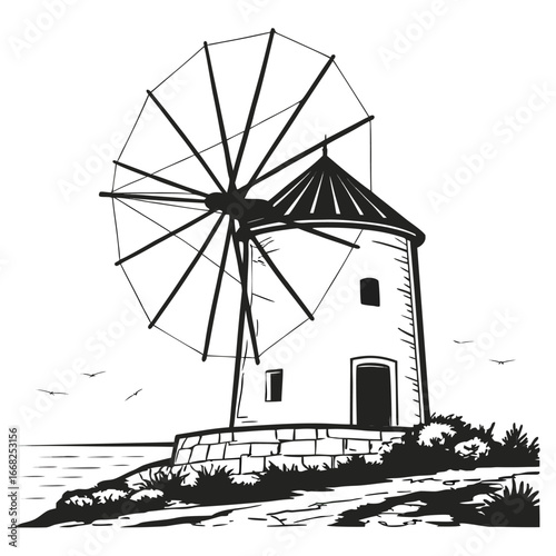 Ancient windmill in coastal town silhouette
