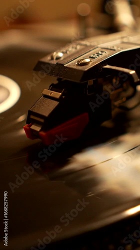 Classic turntable with needle positioned over a vinyl record, evoking nostalgia and the art of music playback.