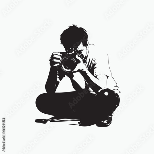 photographer sitting with camera