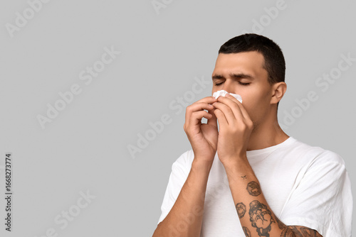 Ill young man with tissue b...