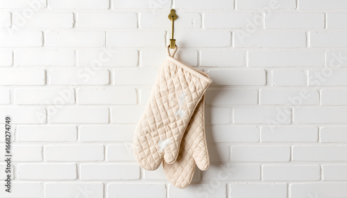 Copy space, background, oven mitts hanging on hook