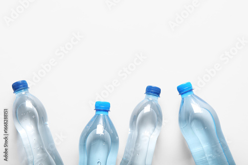 Plastic bottles of water on...