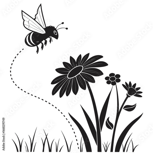 Bee hovering near sunflower silhouette