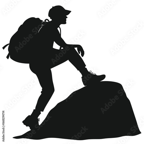 Hiker resting on boulder silhouette