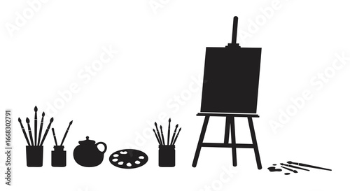 A black silhouette of painting supplies on an easel and table