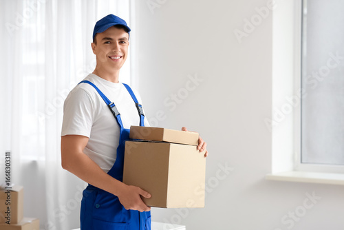 Loader carrying cardboard b...