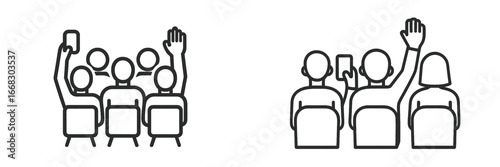 Group of people celebrating at an event with raised hands