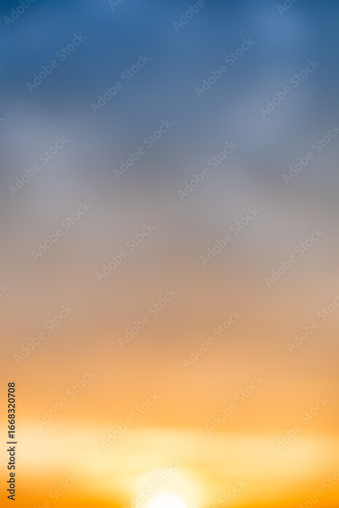 Fototapeta premium Beautiful , luxury soft gradient orange gold clouds and sunlight on the blue sky perfect for the background, take in evening,Twilight, Large size, high definition landscape photo