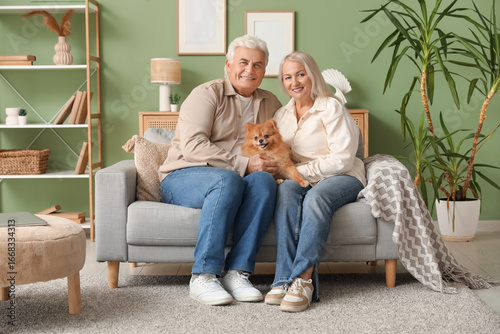 Happy senior couple with ad...