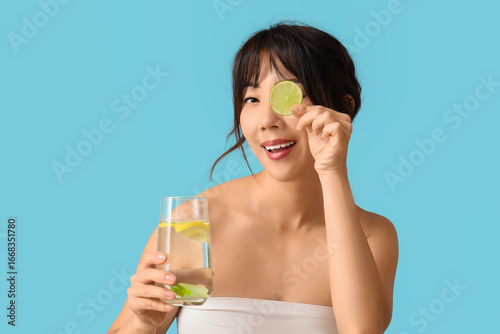 Young Asian woman with citr...