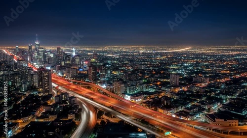 Wallpaper Mural A vibrant city skyline at night showcasing illuminated buildings and busy highways Torontodigital.ca
