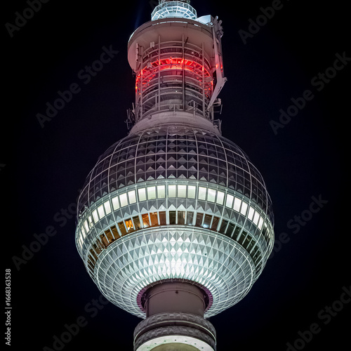 Illuminated Sphere of Berlin TV Tower with Red Light Detail at Night