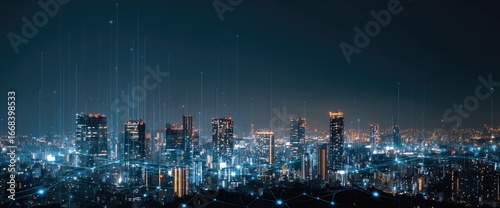 Night cityscape panorama with glowing buildings and abstract digital lines connecting them, suggesting technological network