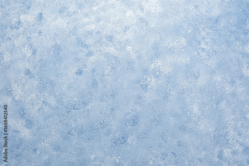 Fototapeta premium Light blue wall texture with soft mottled pattern and plaster effect