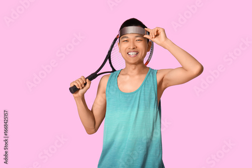 Sporty young Asian man with...