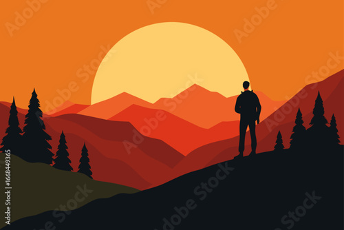 Silhouette of man watching sunset over the mountains