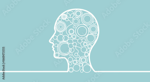 A stylized illustration of a human head silhouette filled with interconnected circular shapes.