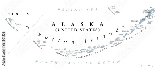 Aleutian Islands, gray political map. Archipelago in the shape of an arc, most belong to the U.S. state of Alaska, while Commander Islands in the west belong to Russian federal subject Kamchatka Krai.