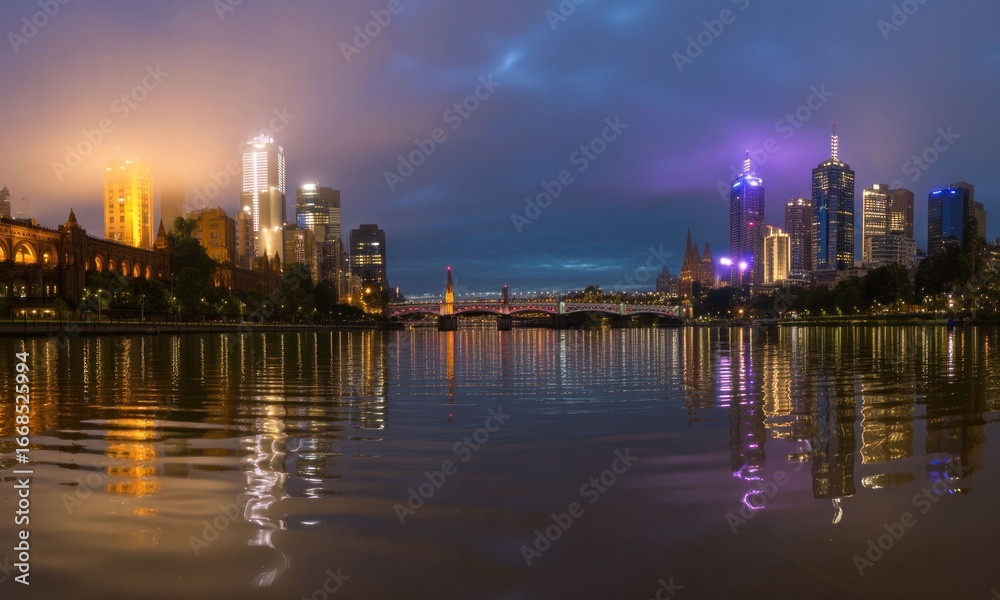 Naklejka premium City skyline reflected in calm river at dawn
