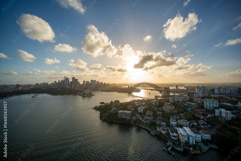 Fototapeta premium Aerial view of Sydney Harbour at sunset