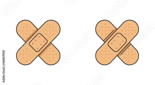 Two beige band aids crossed over each other on white background