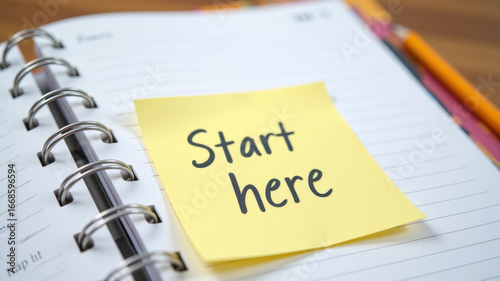 Notebook with first page reading start here written in casual handwriting