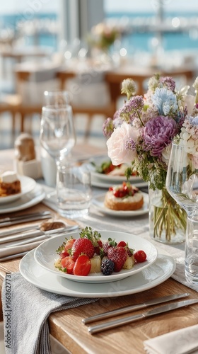 Elegant Summer Dining Table Setting with Fresh Berries and Flowers