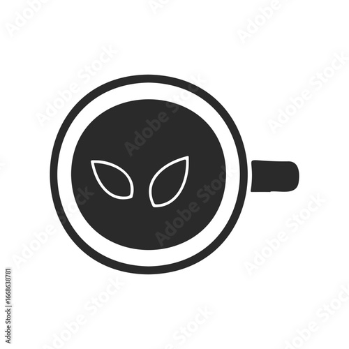 Simple black coffee cup icon with alien face design on white background