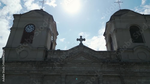 Drone tilt up of a catholic church in an andean province of peru.