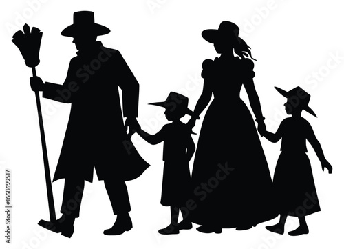 Silhouette of a pioneer family walking with dad carrying a broom