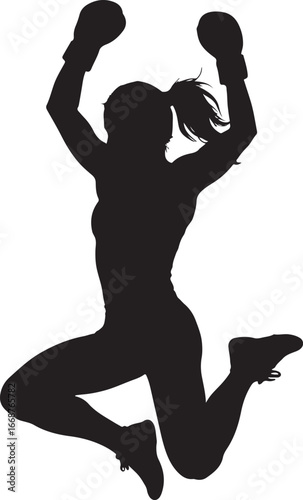 Silhouette of a woman boxing champion jumping in victory pose
